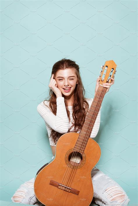 photoshoot poses with guitar|sitting with guitar pose.